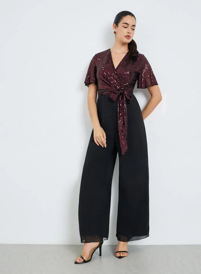 Styli  Women Burgundy Sequin Wrap Front Jumpsuit for Women | Best Price UAE